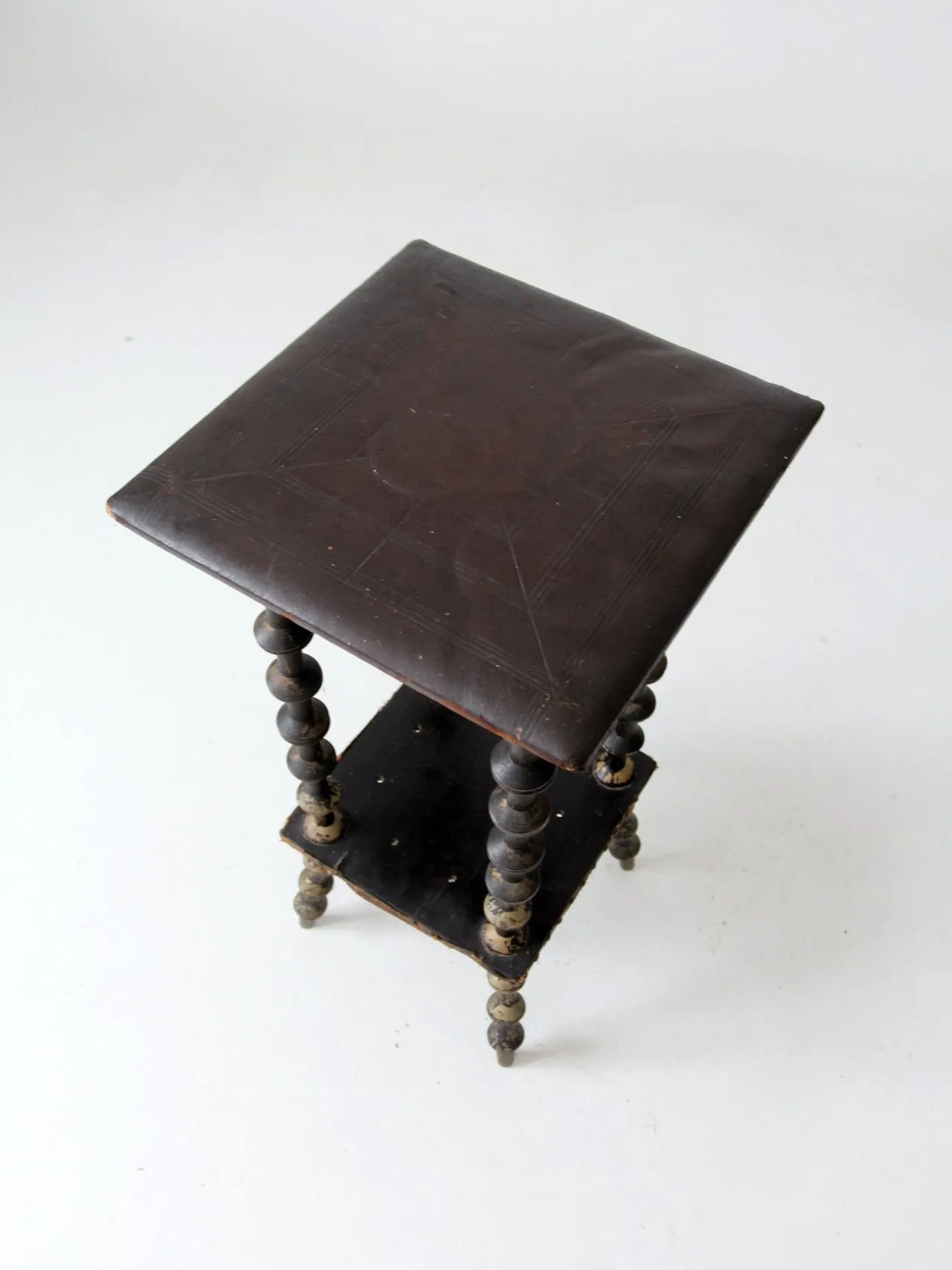 antique spool table with leather top